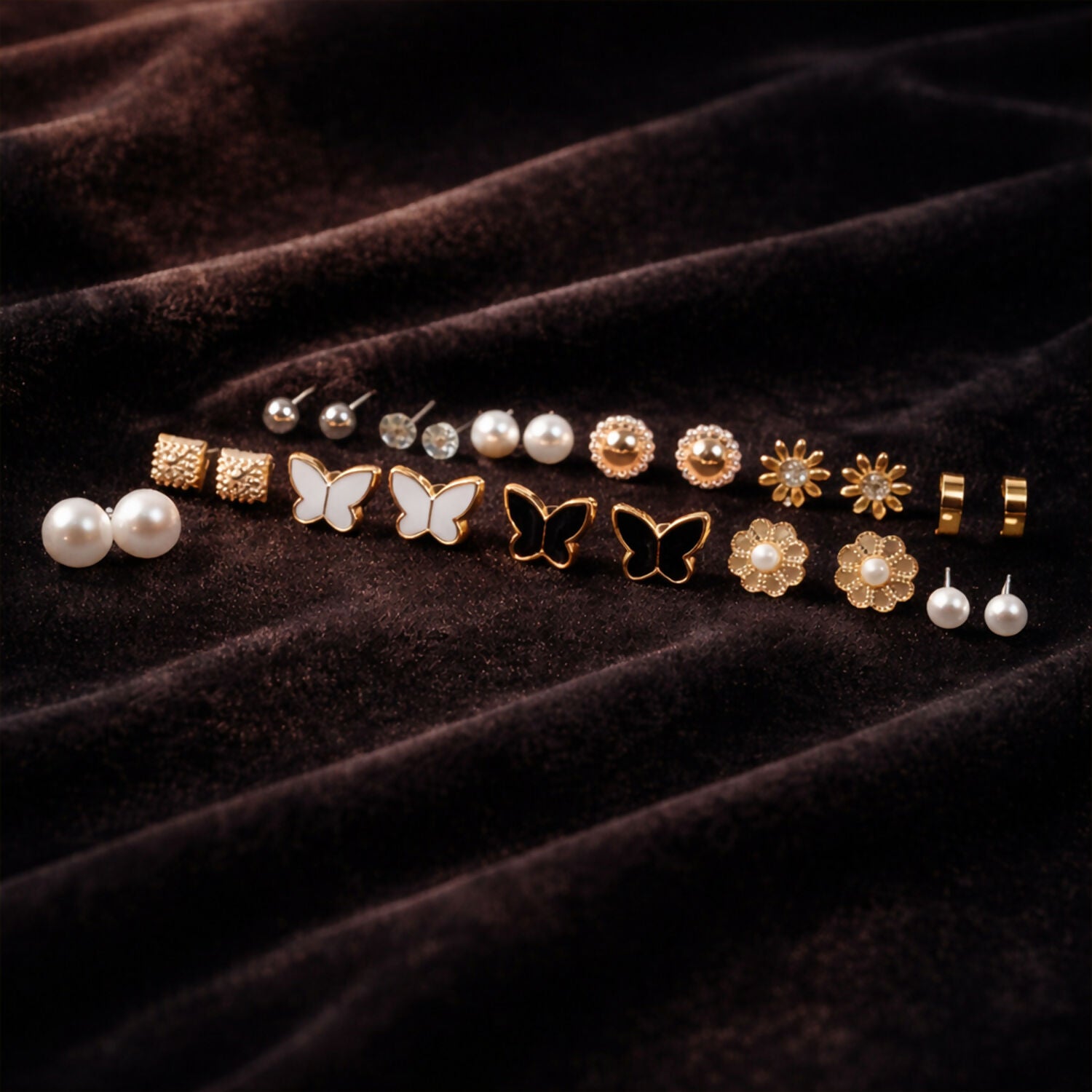 Fashion earrings with crystals and flower designs in the collection