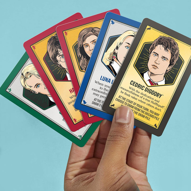 Harry Potter Monopoly Deal cards showing characters and magical actions