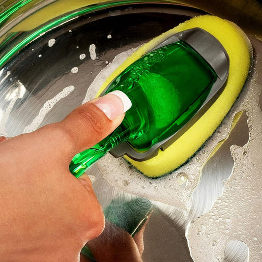 Soap dispensing dish brush