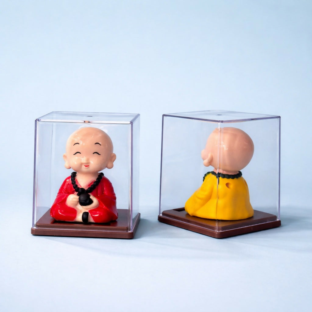 Solar Monk Bobble Head with Moving Head in Clear Display Case (Color may vary)