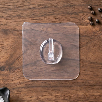 Clear Stick-On Wall Hook in use