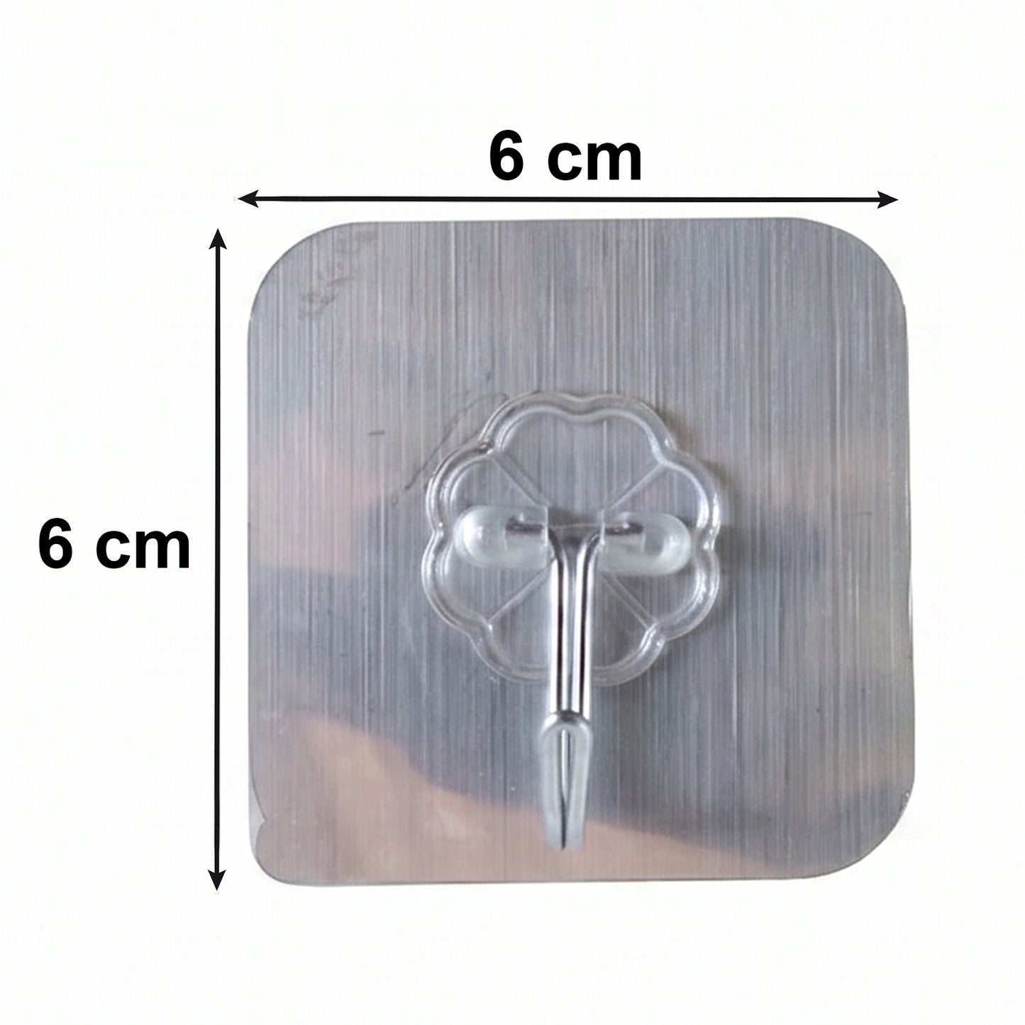 Close up of transparent adhesive hook attached on wall