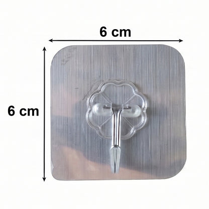 Close up of transparent adhesive hook attached on wall