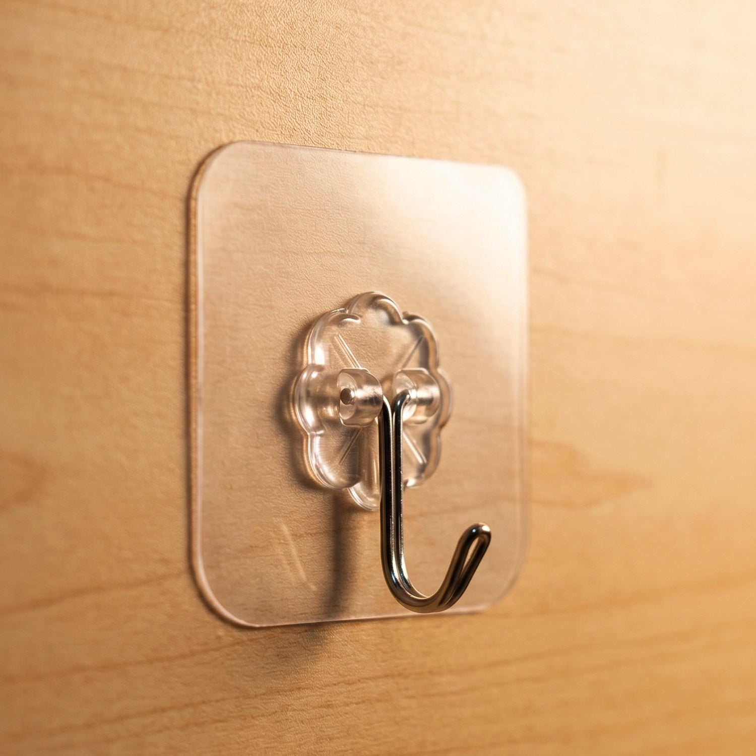 Flower design transparent stick-on wall hook holding keys