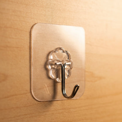 Flower design transparent stick-on wall hook holding keys