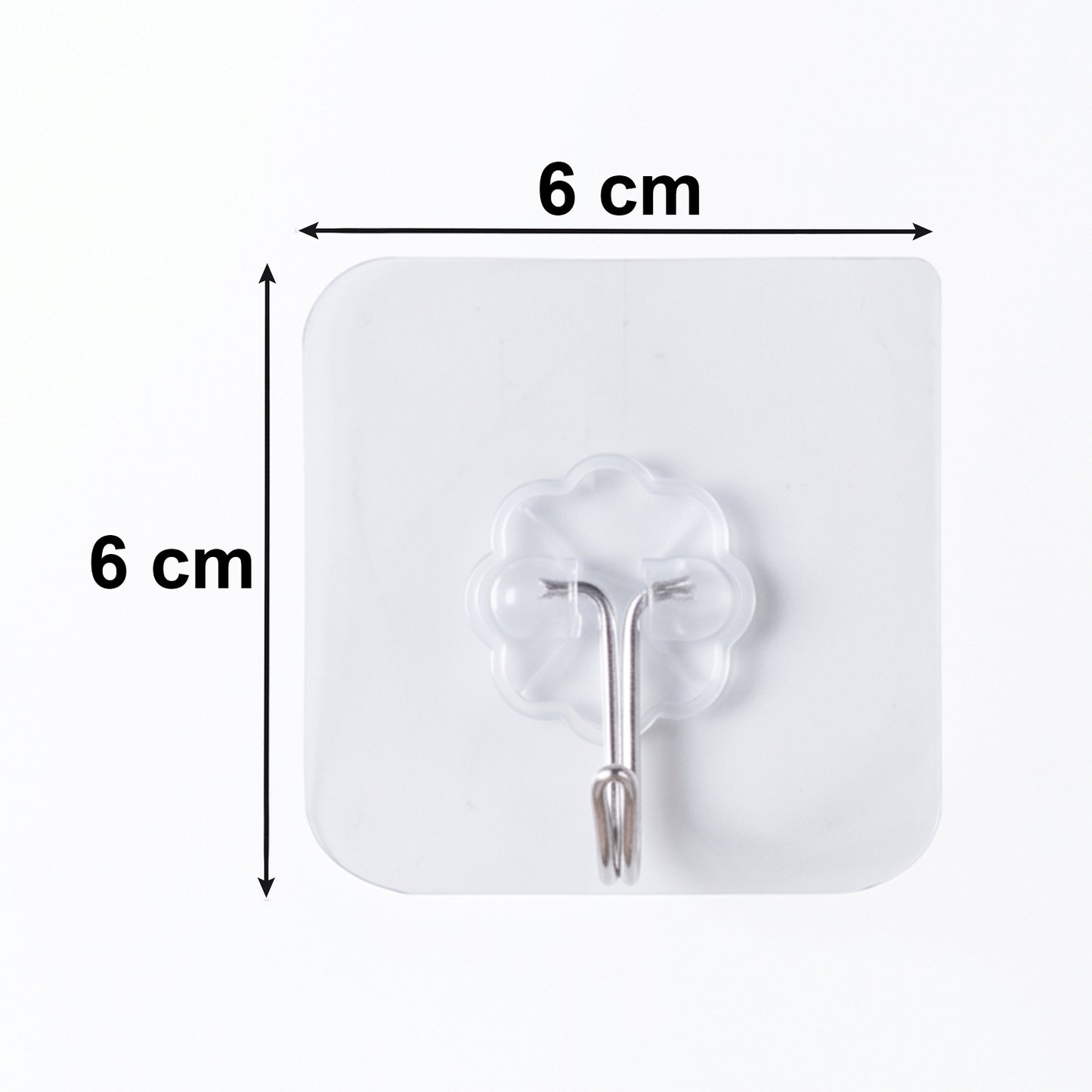 Clear adhesive flower-shaped wall hook in use