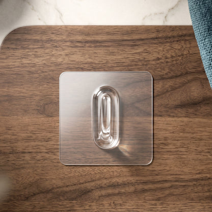 Side view of clear adhesive wall hook