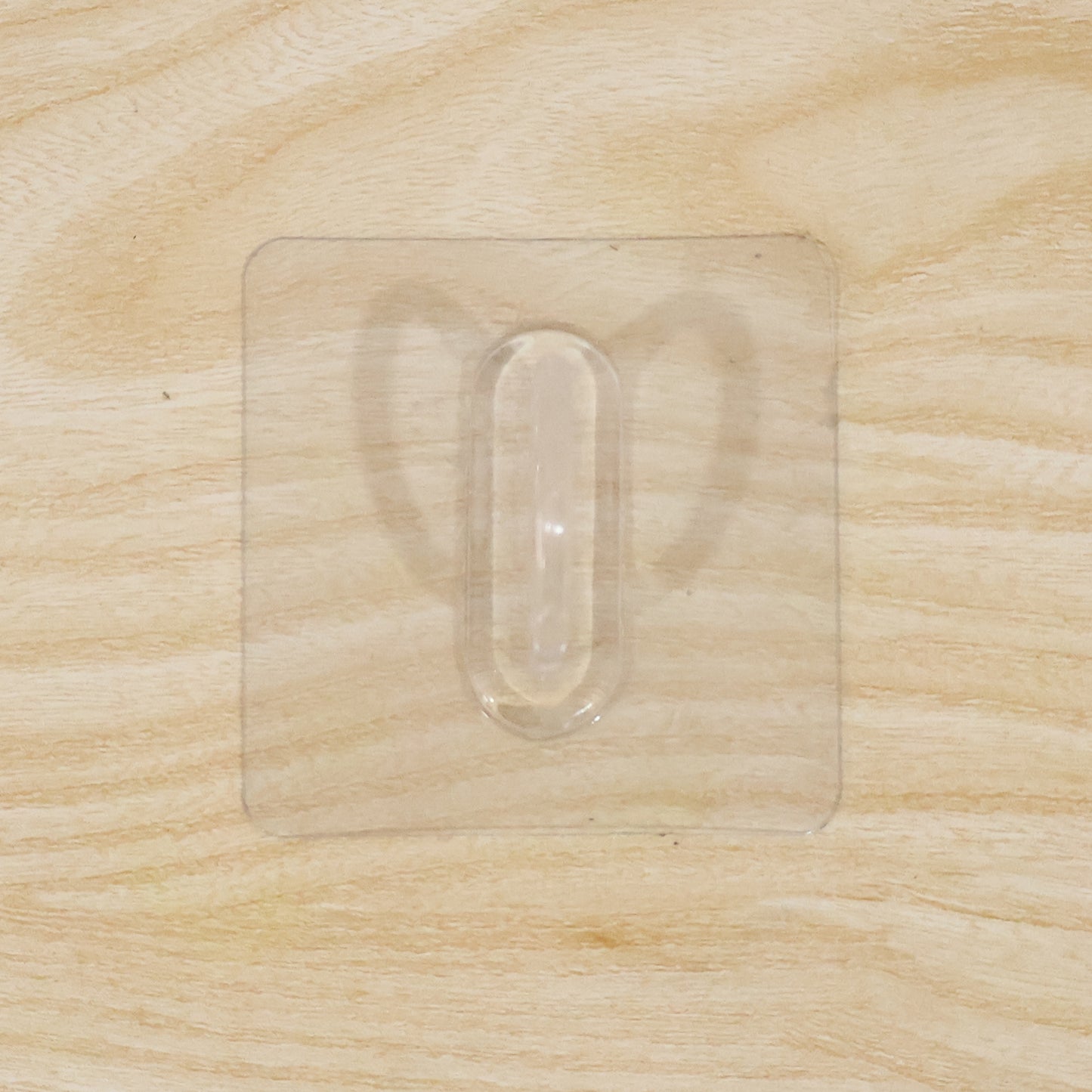 Close-up of clear transparent wall hook