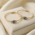 Gold Evil Eye Bangles – Stylish protection with adjustable fit