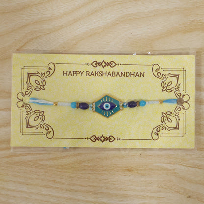 Turquoise evil eye Rakhi tied on wrist