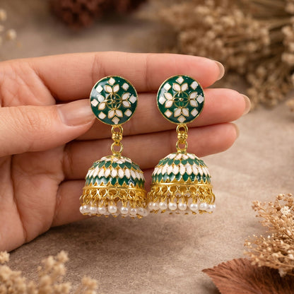 Green jhumka earrings showing intricate dome pattern