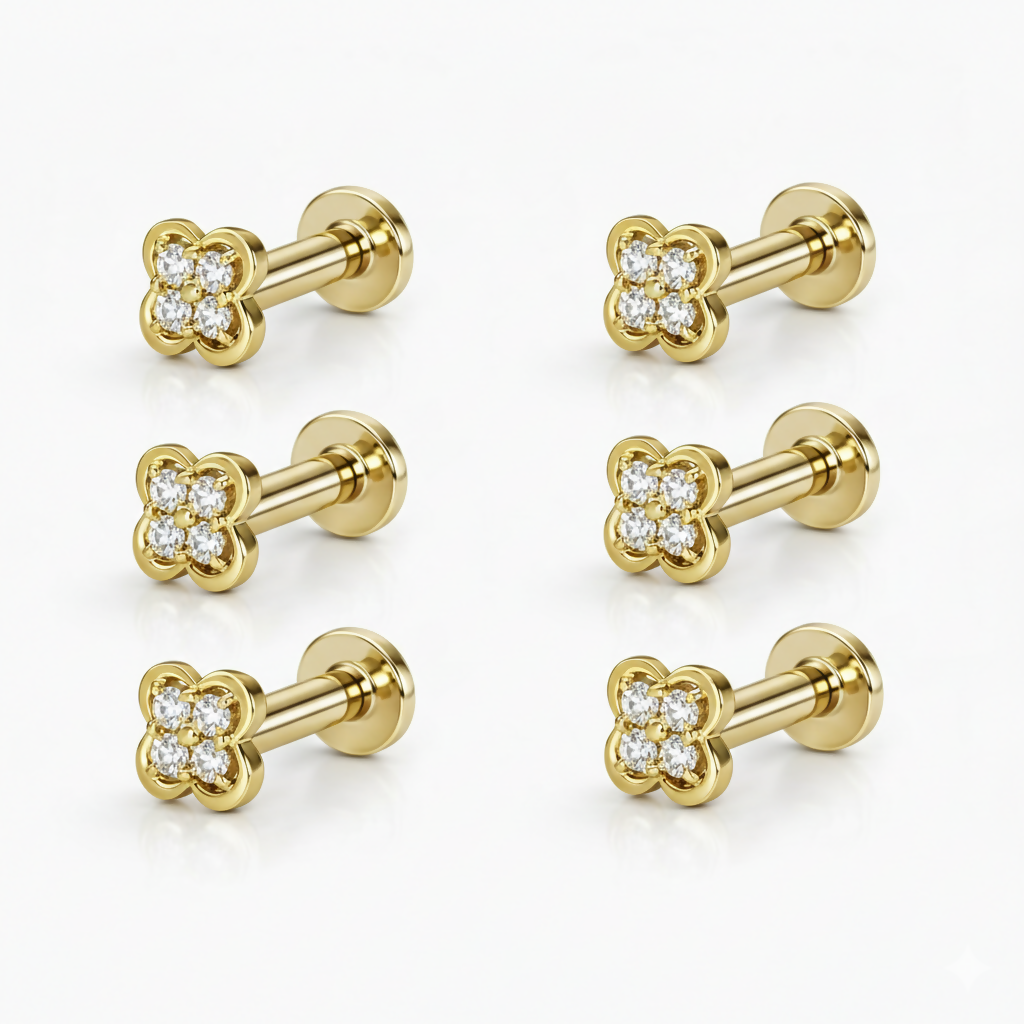Gold plated flat back clover stud earrings displayed on white background