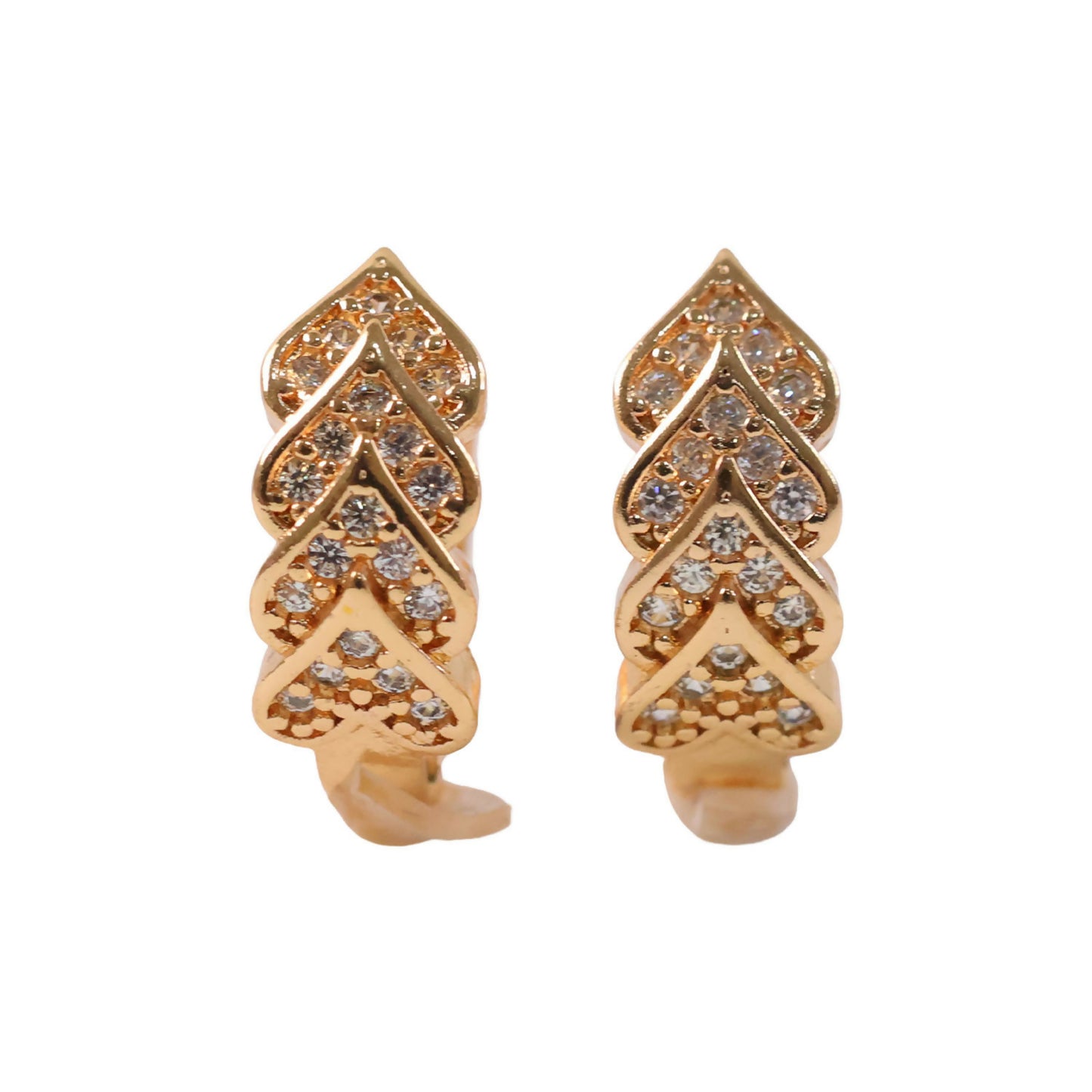 Leaf patterned gold finish earrings with sparkling stone embellishments worn on ear