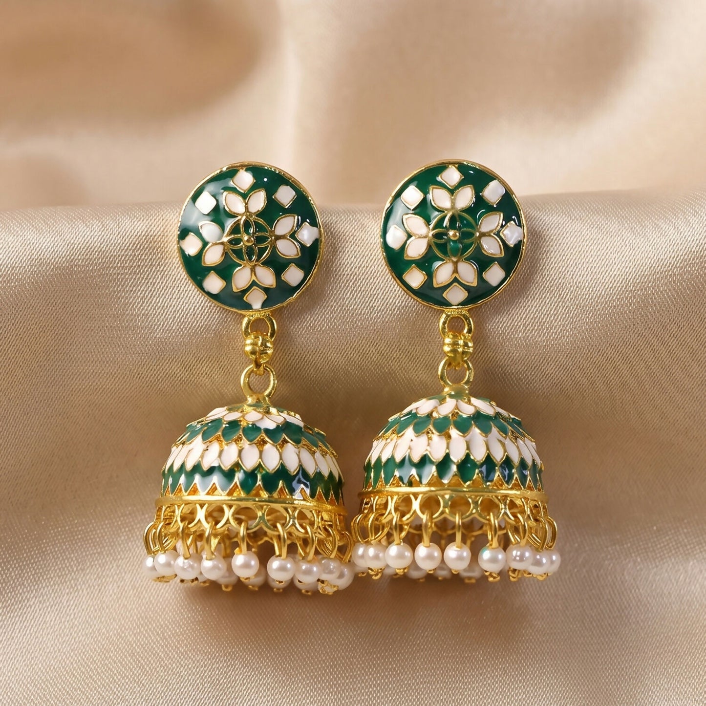 Front view of green stud jhumka earrings with pearl drops