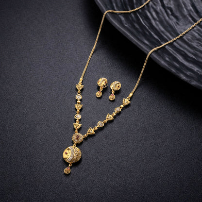 Traditional gold-tone beaded necklace with pendant and matching earrings for special occasions