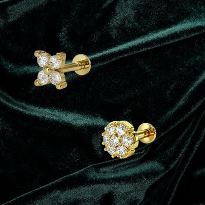 Close-up of flat-back gold plated crystal clover nosepin stud with sparkling CZ crystals