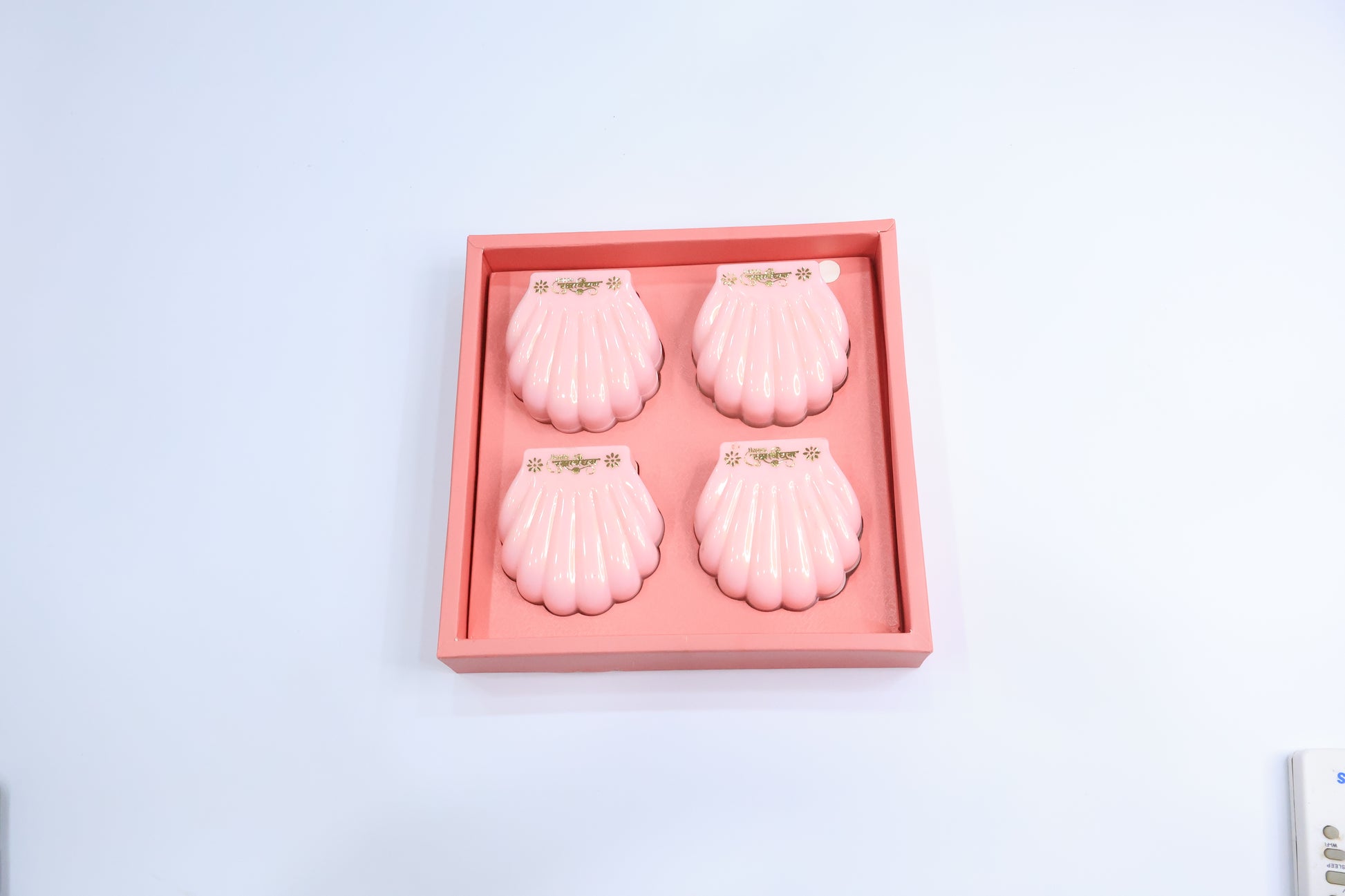 4 Pc Om Rakhi Set with Gold-Plated Dial, Pink & Red Beads – Premium Designer Gift Box for Raksha Bandhan