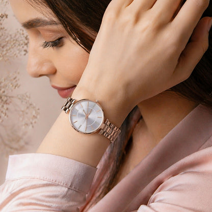 Women's rose gold watch on wrist for casual wear