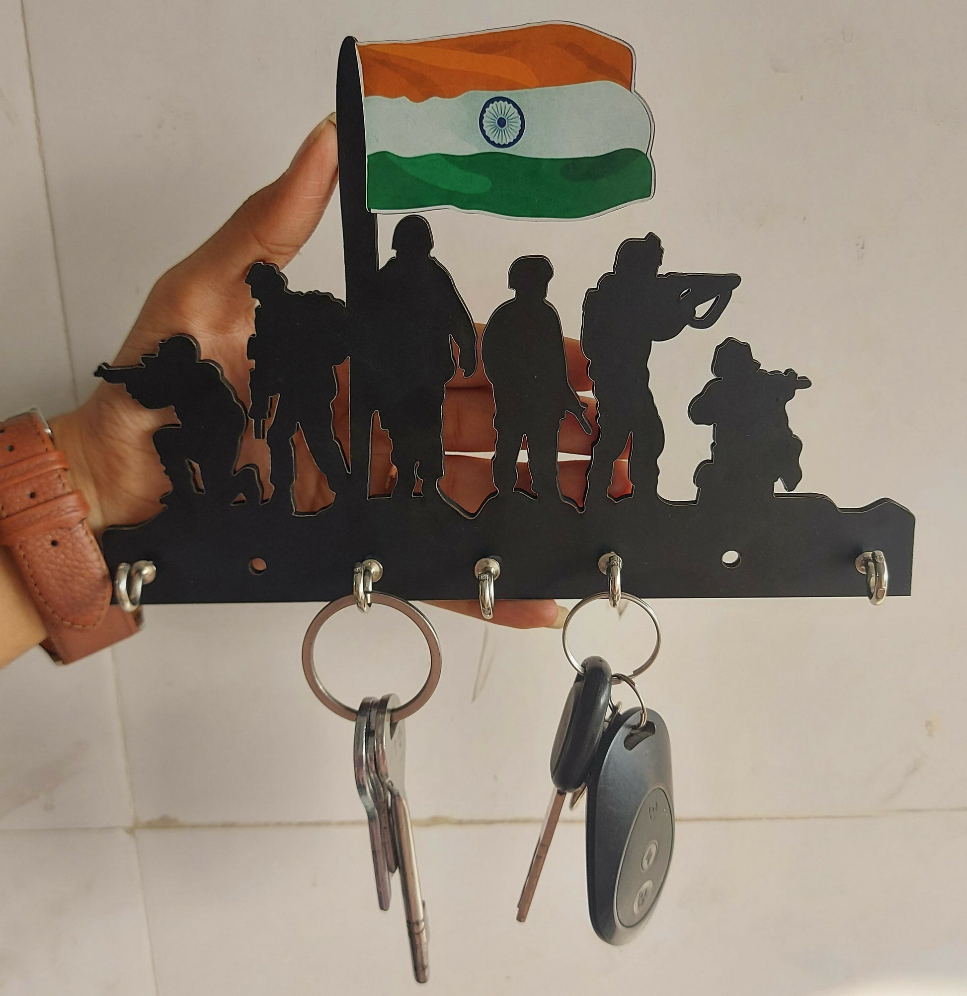 Indian Army key holder mounted on a wall in a home setting