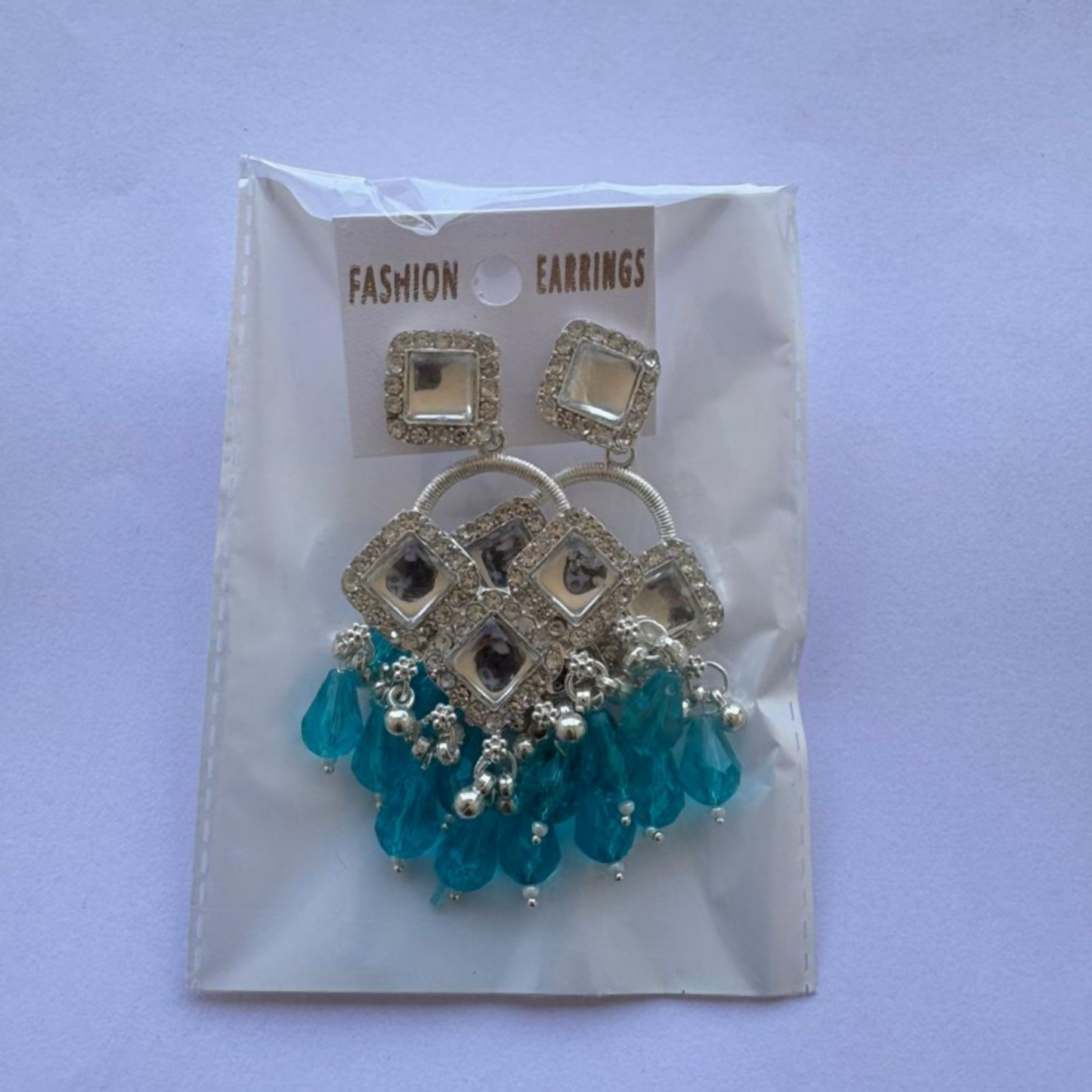 Elegant Silver Plated Chandelier Earrings Featuring Square Crystals and Aqua Blue Teardrop Beads