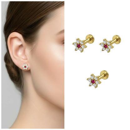 Gold plated flower labret stud with ruby center surrounded by clear crystals