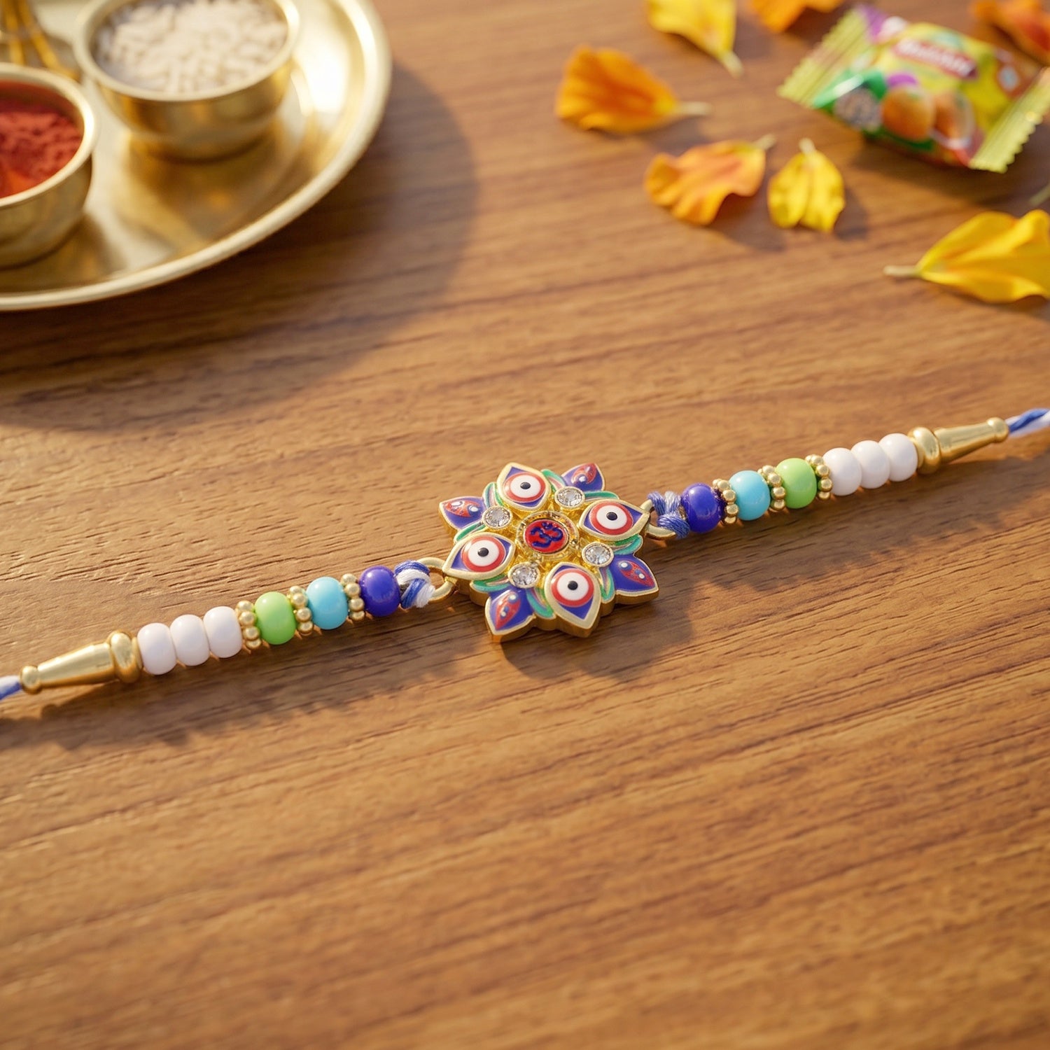 Side angle of Multi Evil Eye OM Star Designer Rakhi