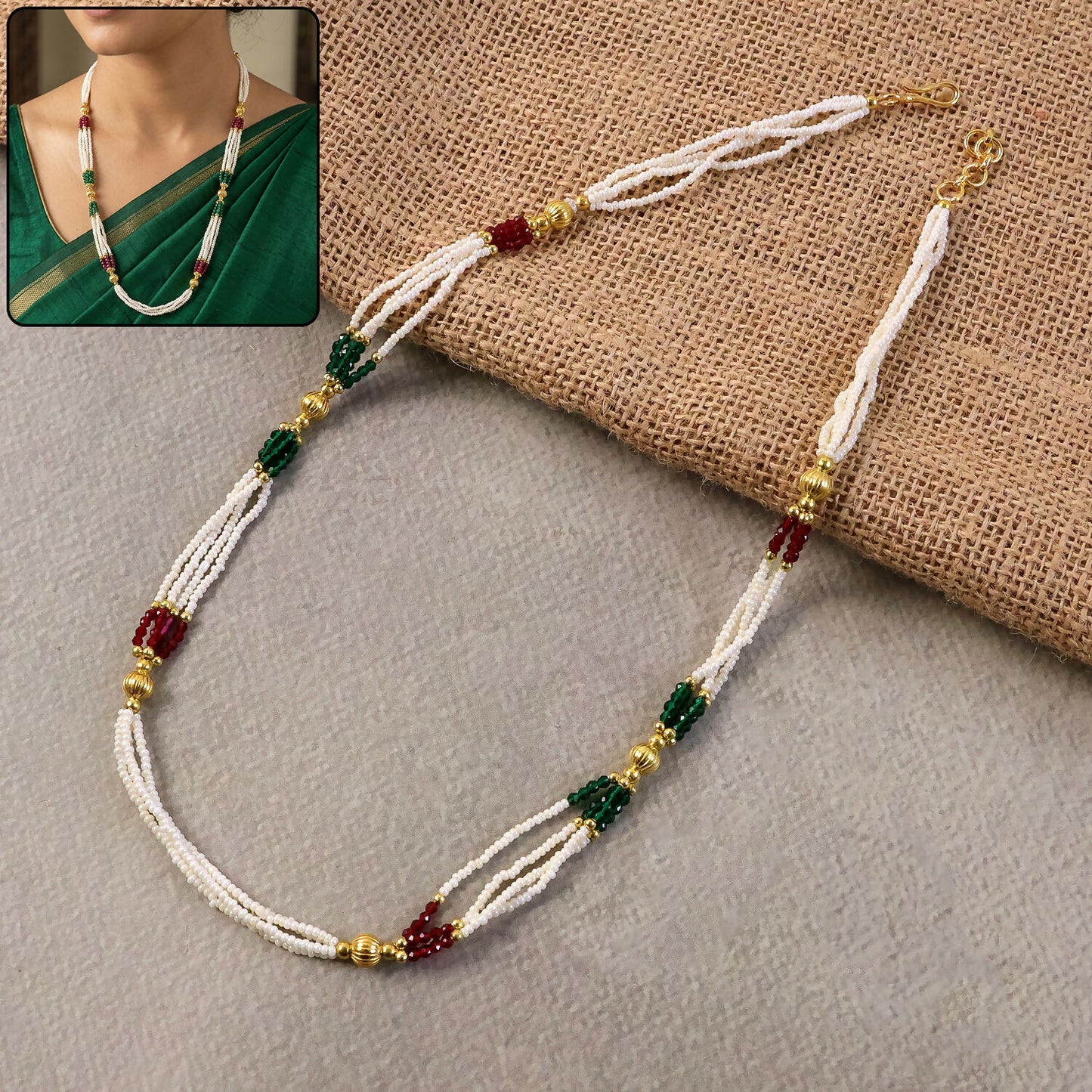 Handmade white beaded mala necklace with gold accents