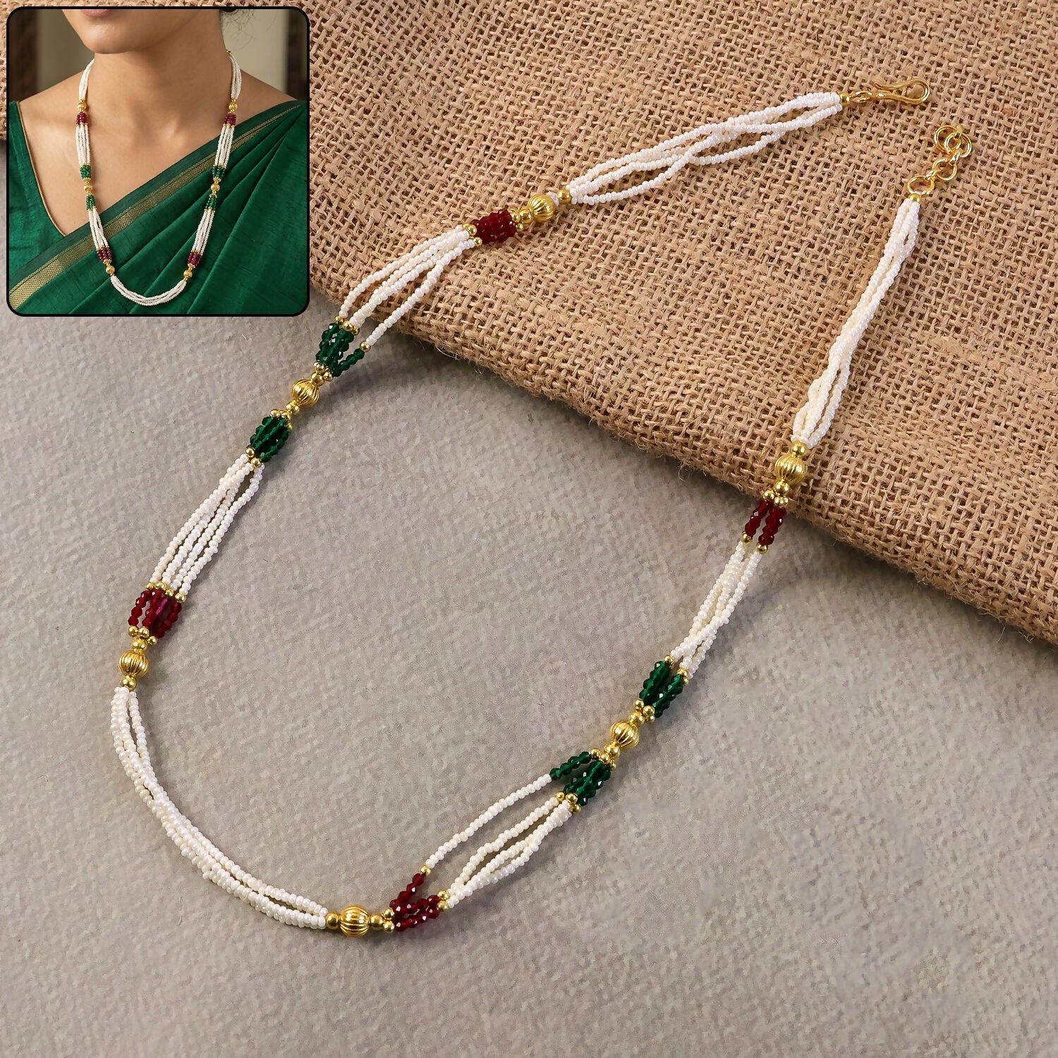 Handmade white beaded mala necklace with gold accents