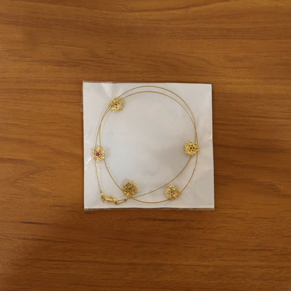 Ruby Blossom Floral Necklace Elegant Golden Petal Design Stylish Chain Jewelry