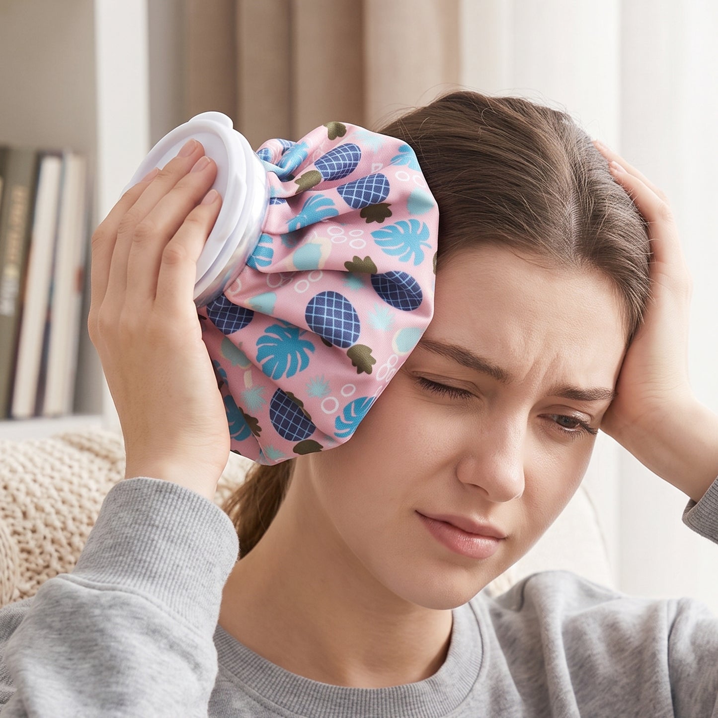 Ice bag held against the forehead to ease a headache