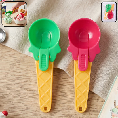 Plastic ice cream scoops on white background