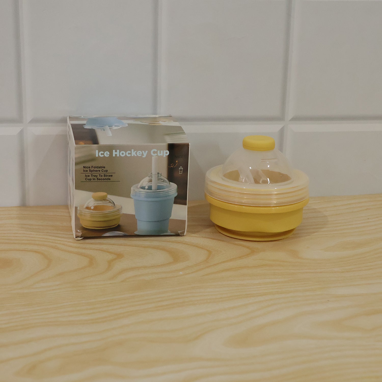 Live photo of silicone foldable travel cup with straw