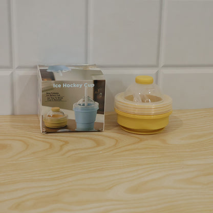 Live photo of silicone foldable travel cup with straw
