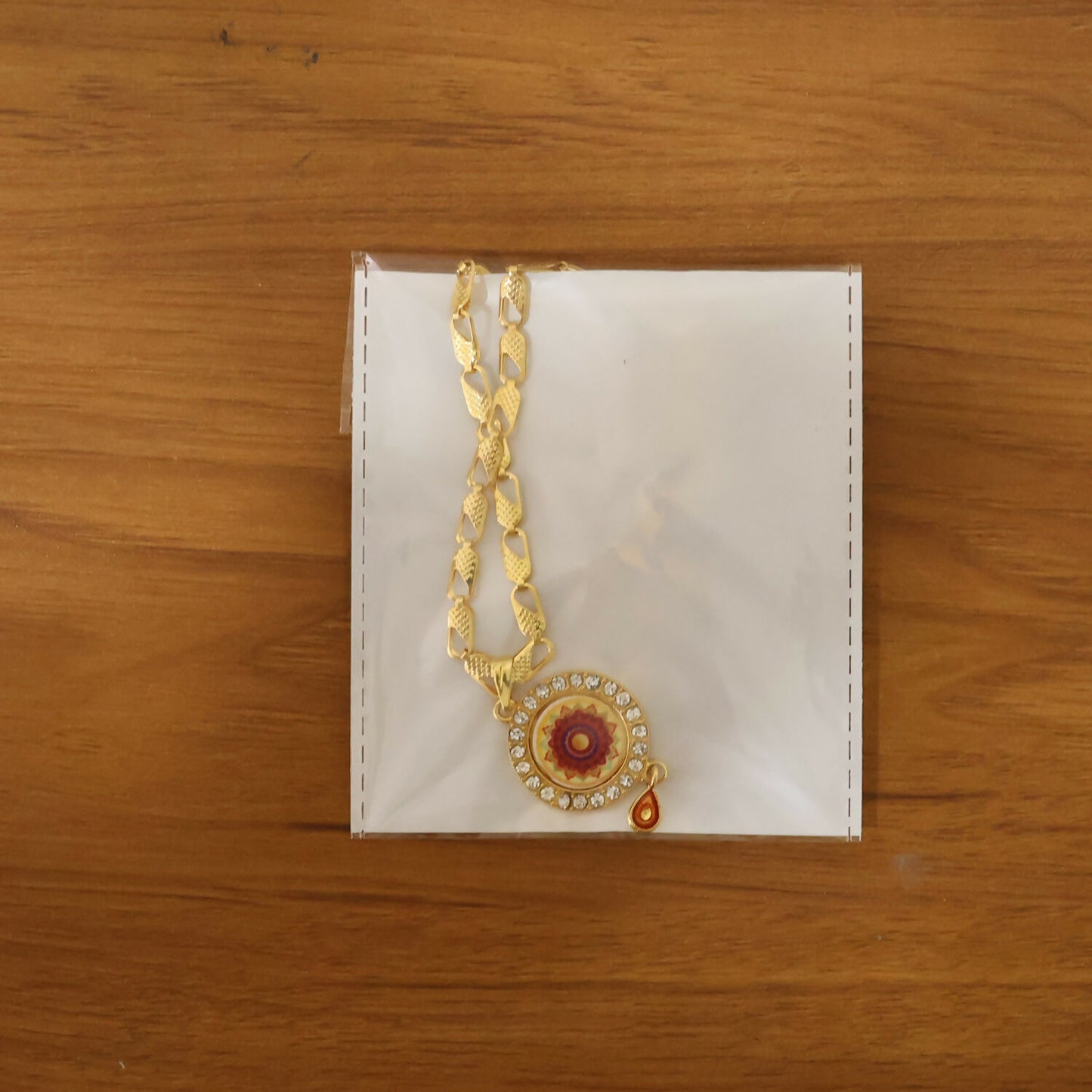 Gold Pendant Necklace with Mandala Design & Stone Detailing