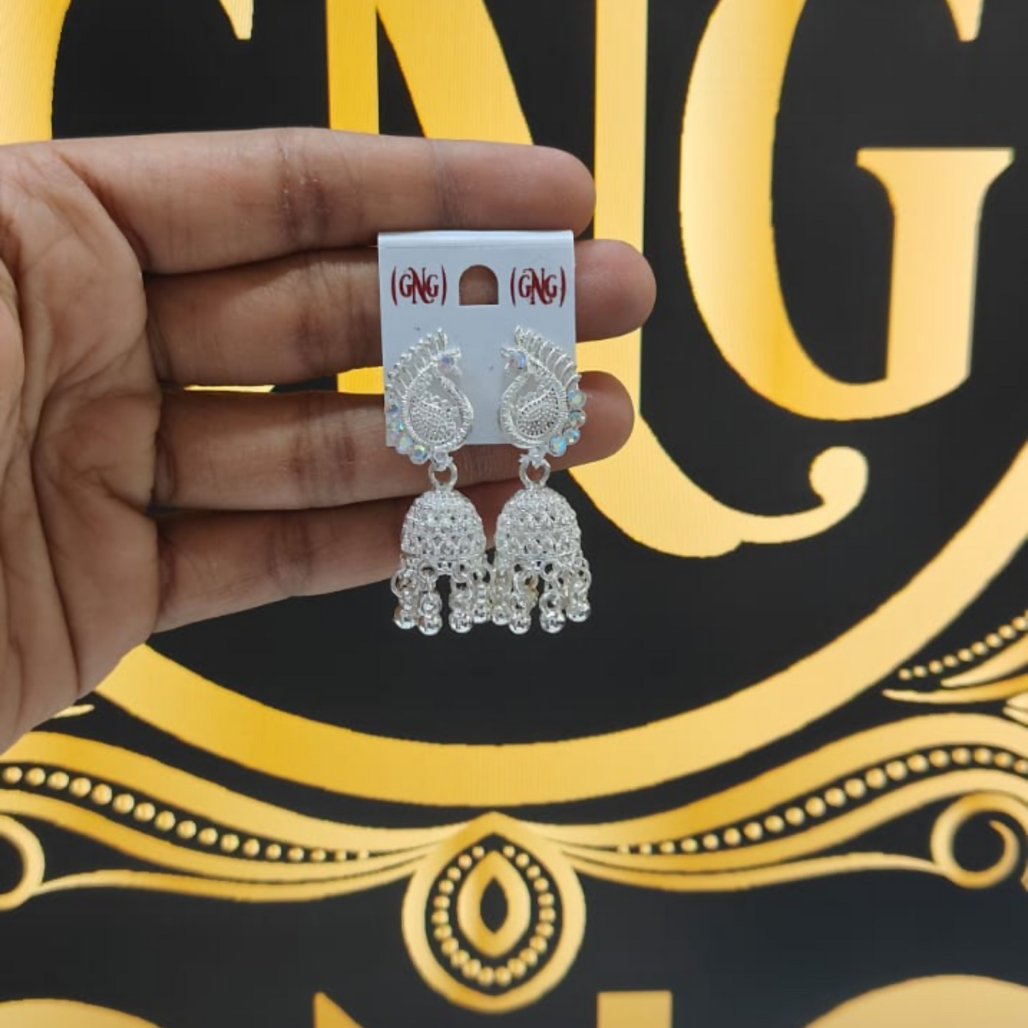 Elegant Silver Finish Peacock Jhumka Earrings