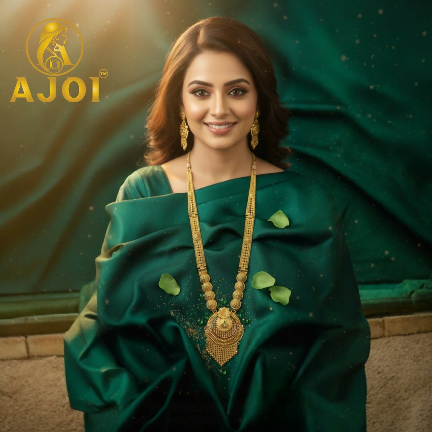 Close-up of emerald toned necklace with a luminous gold finish