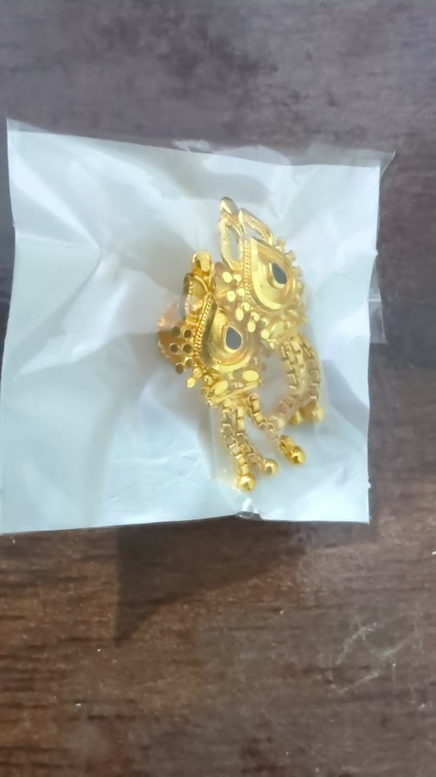 Elegant 3 Line Golden Earrings showcasing classic bell-shaped drop with filigree details