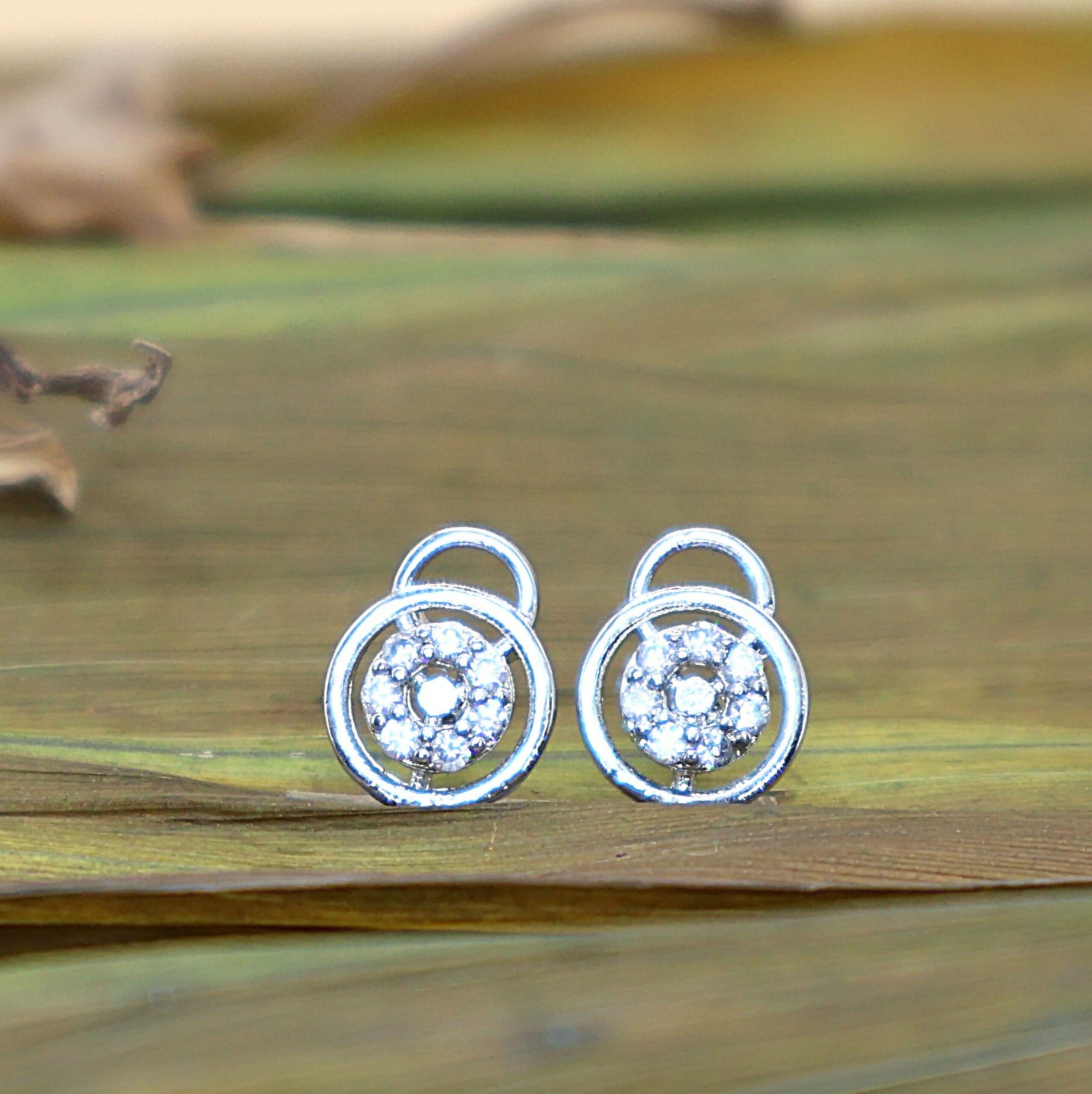 Silver Stud Earrings: Diamond-Look AD Circle Flower Design