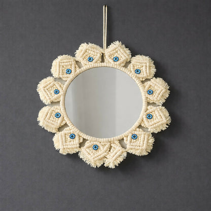 Round decorative wall mirror with handwoven cotton rope details