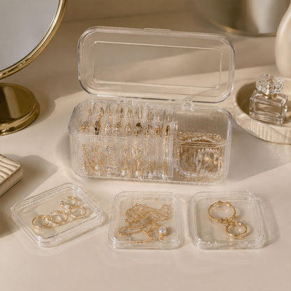 Compact acrylic jewelry storage with removable cases for jewelry organization.