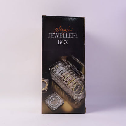 Transparent acrylic jewelry box with lid, perfect for home and travel storage.