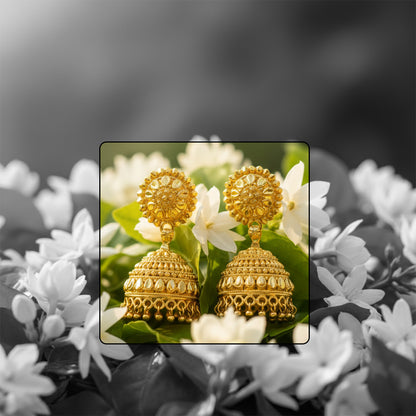 Side view of gold plated jhumka earrings showing delicate hanging beads