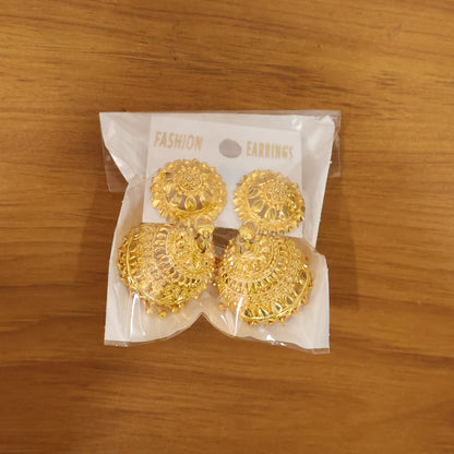 Gold plated jhumka earrings highlighting dome shape and bead details