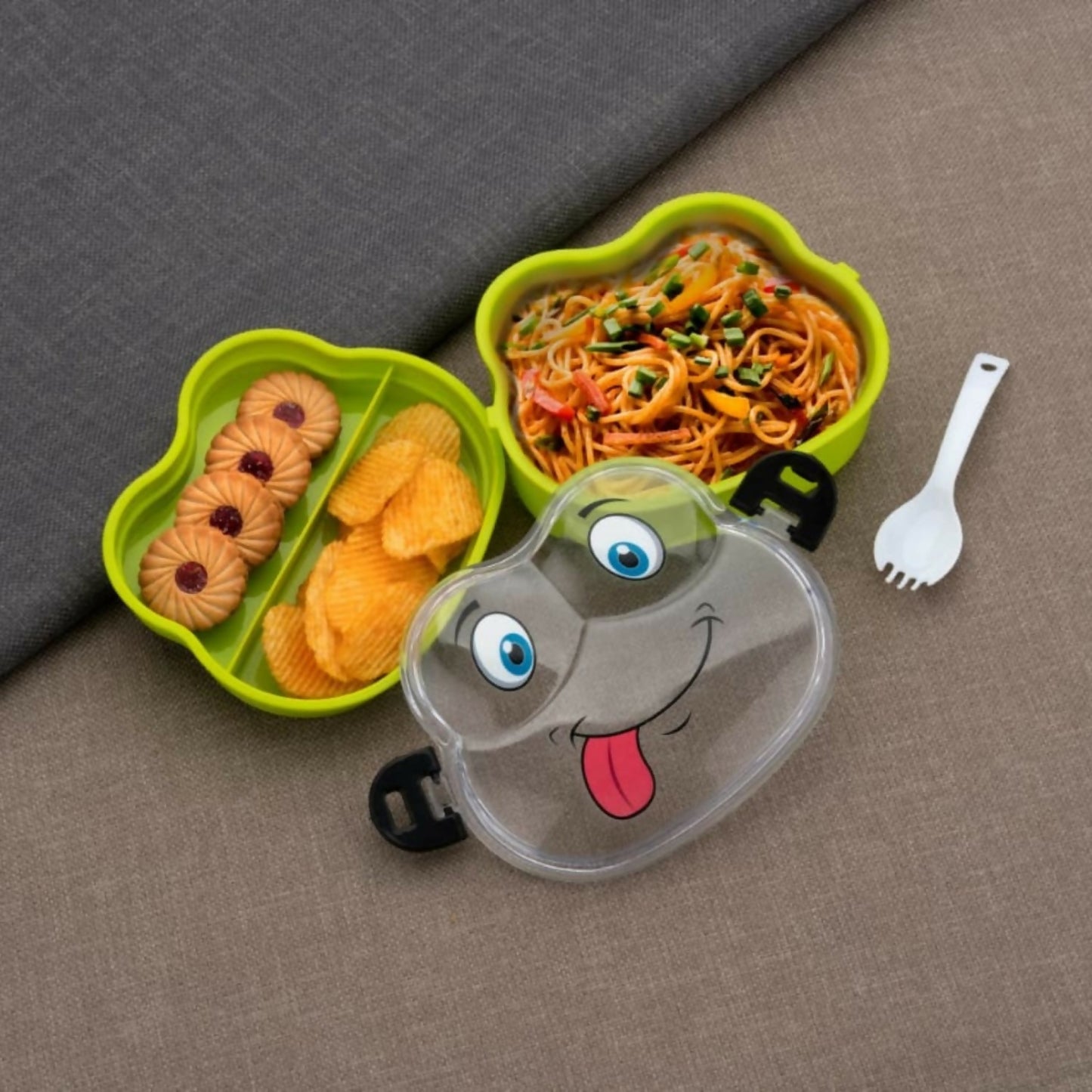 Inside view showing multiple compartments of frog lunch box for kids
