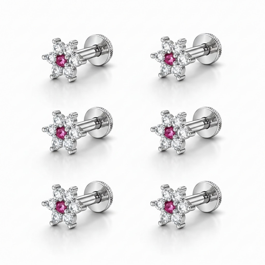 Silver plated pink crystal flower stud earrings displayed in packaging