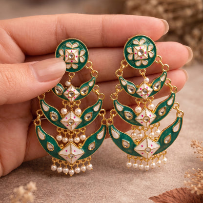 Side view of Emerald Pista Pearl Drop Earrings