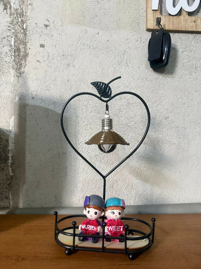 Side view of romantic couple decorative table lamp