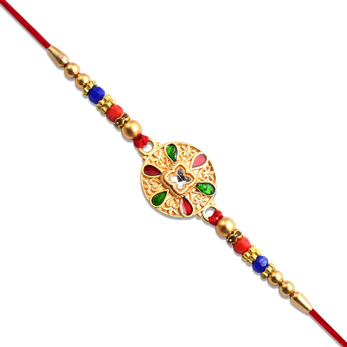 Elegant Gold Rakhi with Intricate Design: A Symbol of Love and Protection