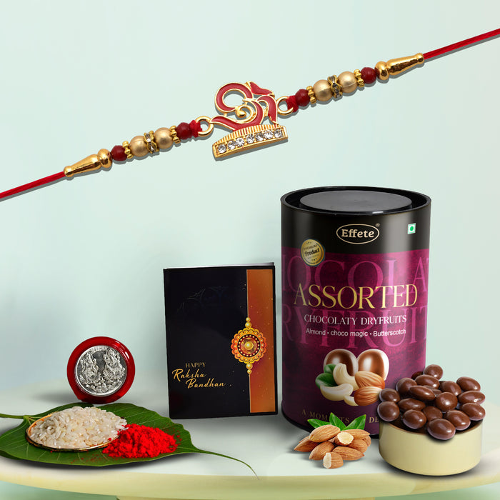 Om Design With Diamonds & Beads With Effete Assorted Chocolate 96Gm ,Silver Color Pooja Coin, Roli Chawal & Greeting Card
