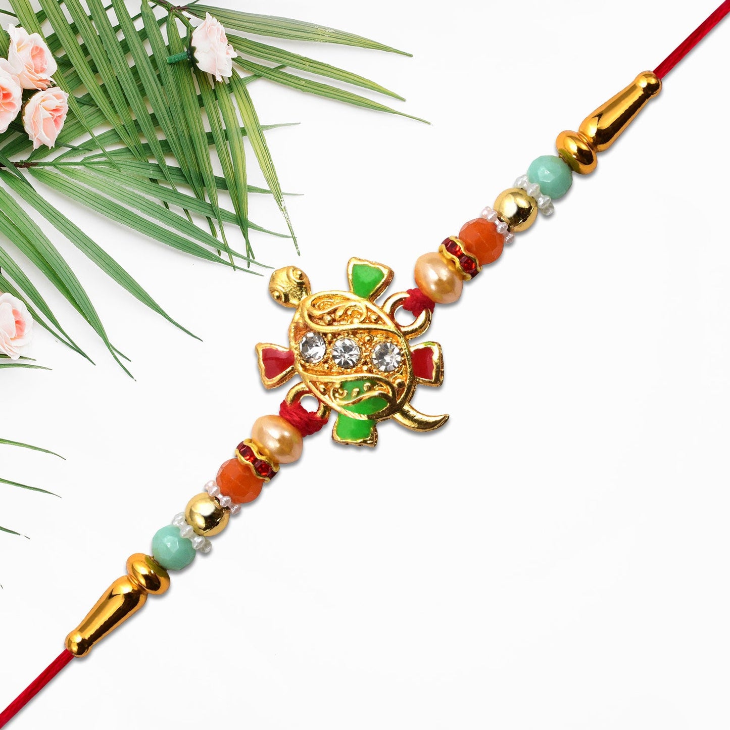 Side angle tortoise design rakhi with stones and beads